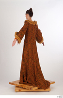  Photos Woman in Historical Dress 34 15th century Historical clothing a poses brown dress whole body 0004.jpg